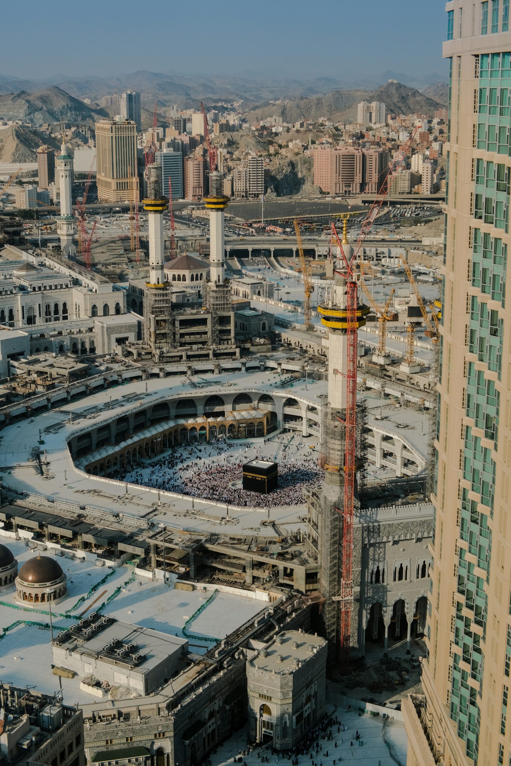 An aerial view of a city with tall buildings