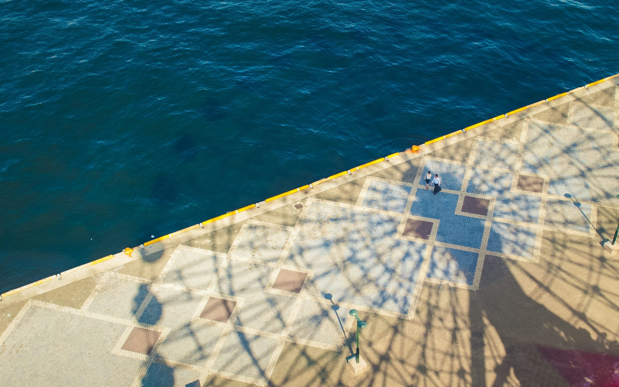 shadow next to a body of water